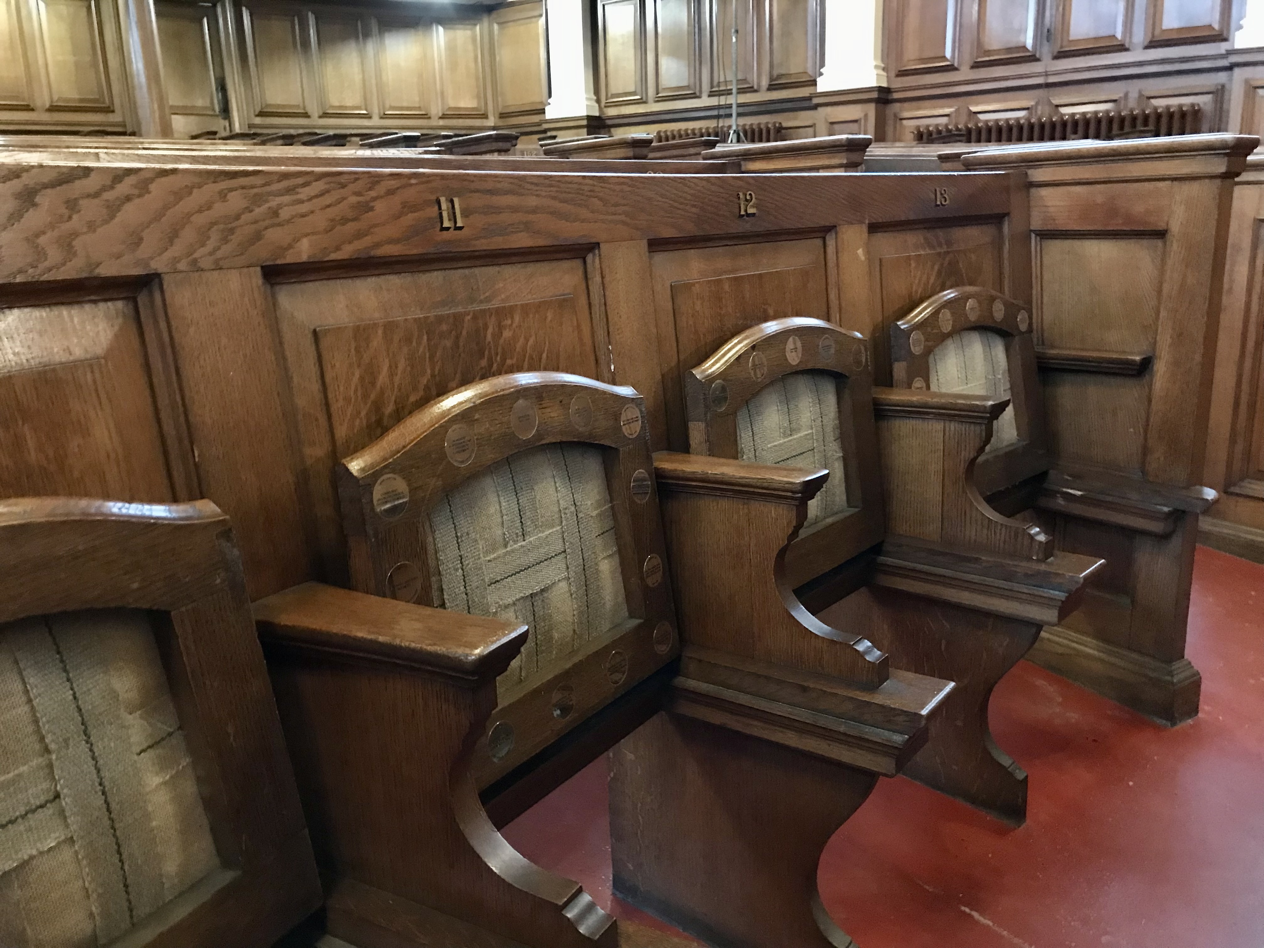 Miners Hall oak seats before restoration